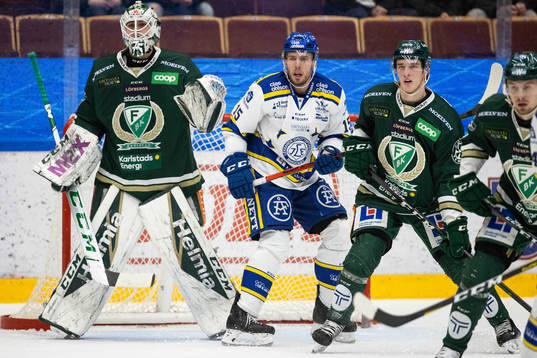 Färjestads målvakt Arvid Holm och Leksands Matt Carey