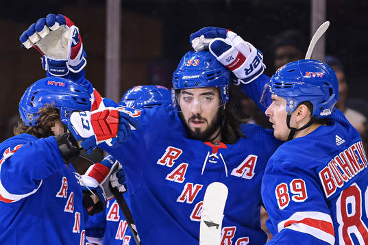 New York Rangers Mika Zibanejad celebrates with teammates
