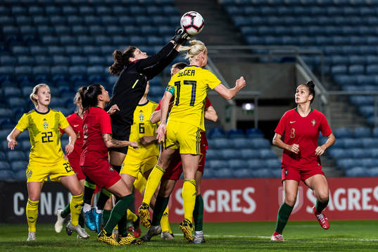 goalkeer Ines Pereira of Portugal against Caroline Seger of