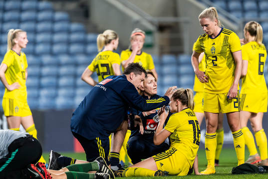 Fridolina Rolfö of Sweden receives medical treatment