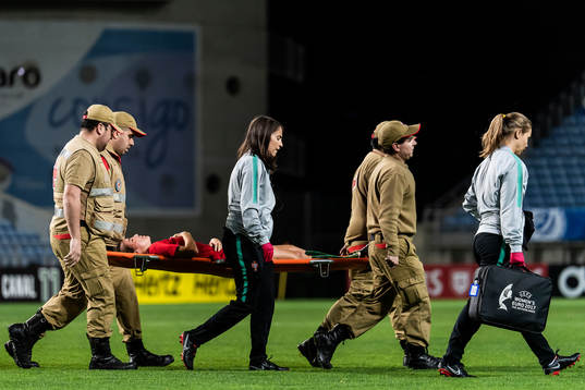 Joana Marchao of Portugal recieves medical treatment