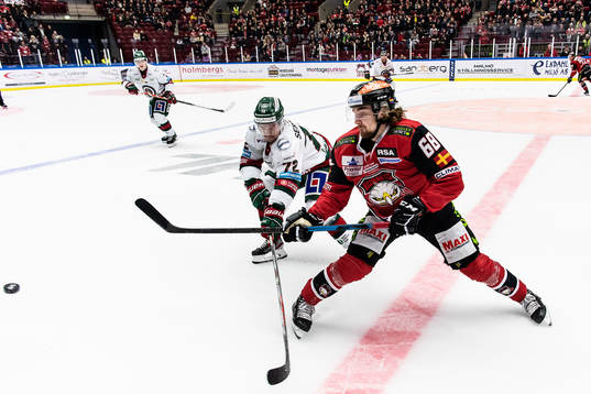 Frölundas Patrik Carlsson och Malmö Redhawks Adam Brodecki