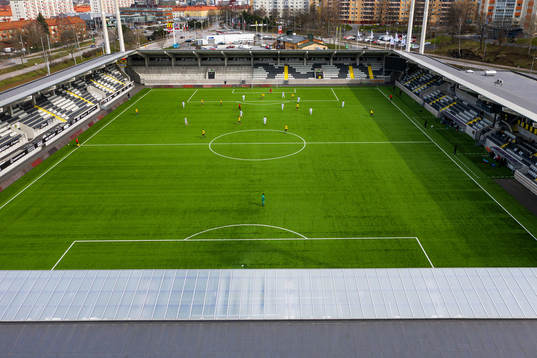 Drönarvy över Bravida Arena med tomma läktare på grund