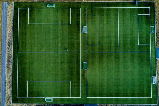 General view of empty football pitches as the Coronavirus,