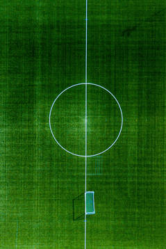 General view of an empty football pitch as the Coronavirus,