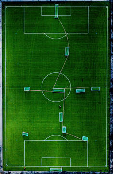 General view of an empty football pitch as the Coronavirus,