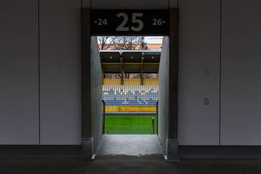 The pitch of Studenternas IP is seen through an entrance
