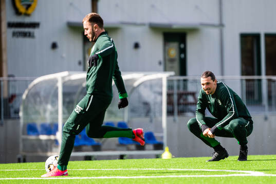 Muamer Tankovic and Zlatan Ibrahimovic participate in a