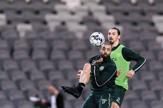 Abdul Khalili and Zlatan Ibrahimovic participate in a