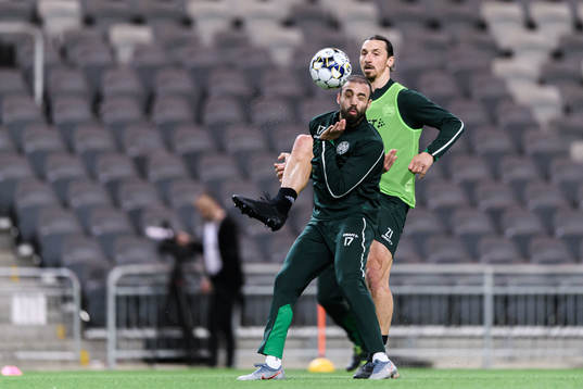 Abdul Khalili and Zlatan Ibrahimovic participate in a