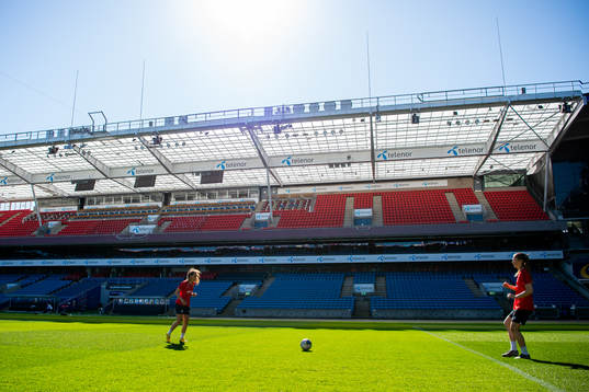 Ingrid Moe Wold and goalkeeper Cecilie Hauståker