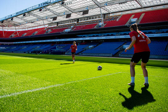 Ingrid Moe Wold and goalkeeper Cecilie Hauståker