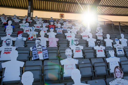 Paper dolls in the stands