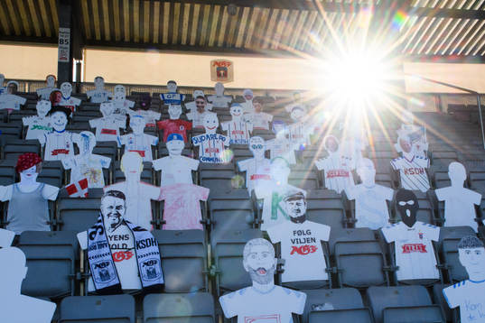 Paper dolls in the stands
