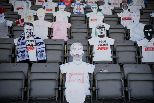 Paper dolls in the stands