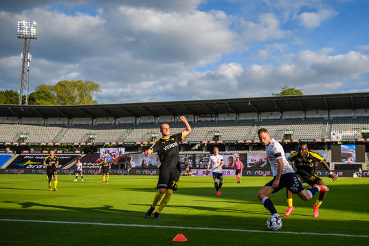 Mikkel Kallesö and Alhaji Kamara of Randers in action with