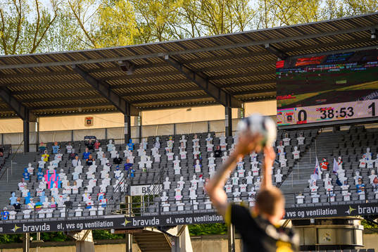 Paper dolls in the stands