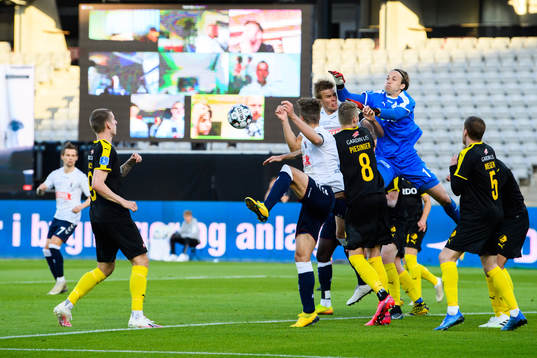 Goalkeeper Patrik Carlgren of Randers in action infront of