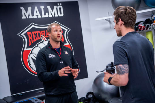 Jesper Jensen Aabo och fystränare Freddie Sjögren med