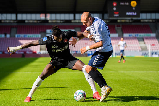 Sory Kaba of Midtjylland and Michael Lump of Horsens