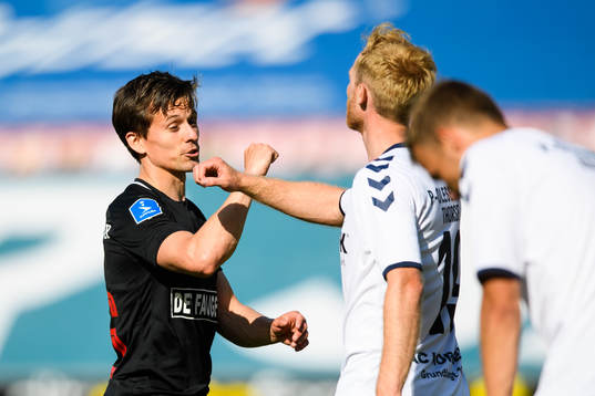 Lasse Vibe of Midtjylland and Jonas Thorsen of Horsens