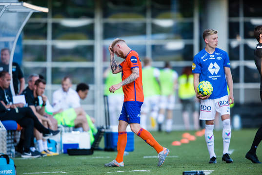 Fredrik Kjernmoen Carlsen of Aalesund leaves the pitch with