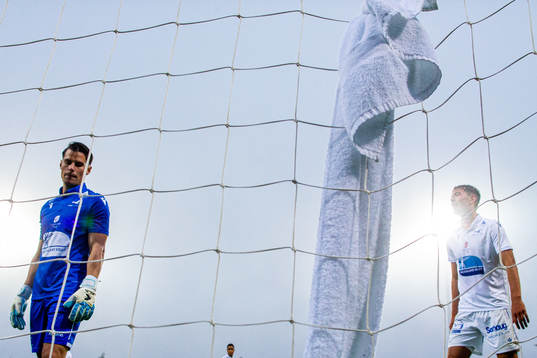 Goalkeeper Helge Sandvik and Fredrik Pallesen Knudsen of