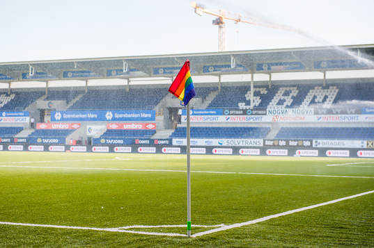 A rainbow-colored corner flag at Color Line Stadion