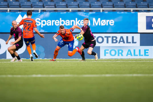 Holmbert Aron Briem Fridjonsson of Aalesund and Ole Martin