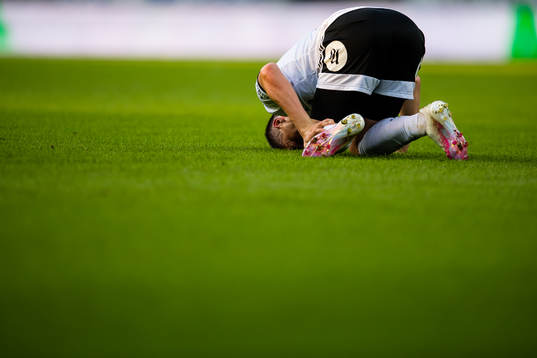 Pål Andre Helland of Rosenborg in pain