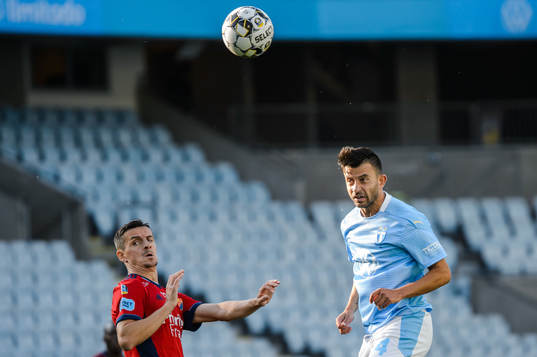 Djurgårdens Haris Radetinac och Malmö FFs Behrang Safari