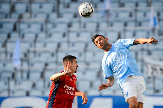 Djurgårdens Haris Radetinac och Malmö FFs Behrang Safari