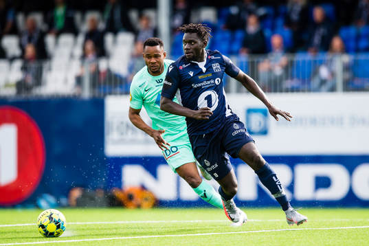 Leke Samson James of Molde and Aliou Coly of Kristiansund