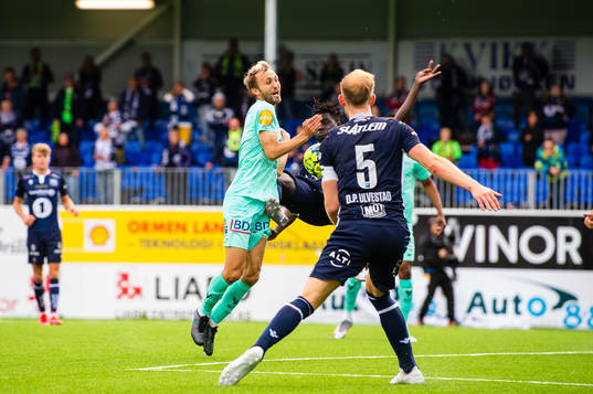 Magnus Wolff Eikrem of Molde and Aliou Coly of Kristiansund