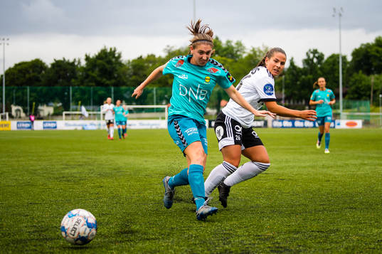 Karly Røstbakken of LSK Kvinner and Marita Olsen of