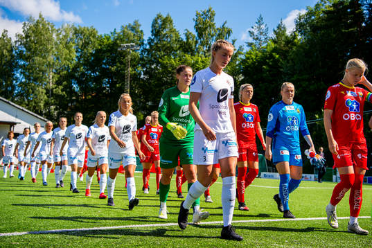 Goalkeeper Teagan Micah and Helene Gloppen of Arna-Bjørnar