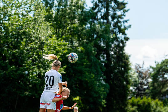 Emelie Løvgren of Arna-Bjørnar and Vilde Gullhaug Birkeli