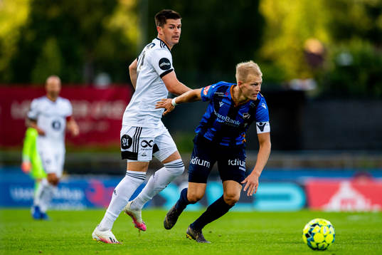 Pål André Helland of Rosenborg and Andreas Hanche-Olsen