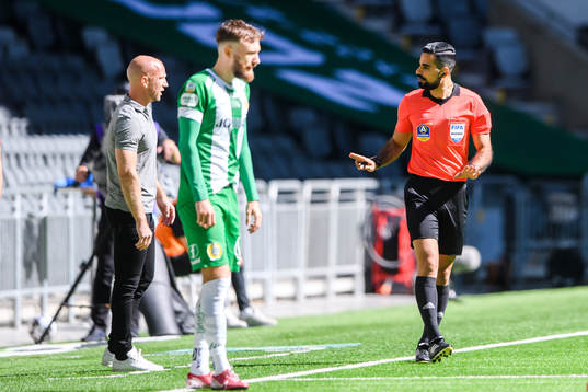 Sirius tränare Henrik Rydström och domare Mohammed