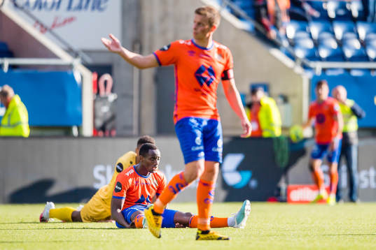 Parfait Bizoza of Aalesund looks dejected