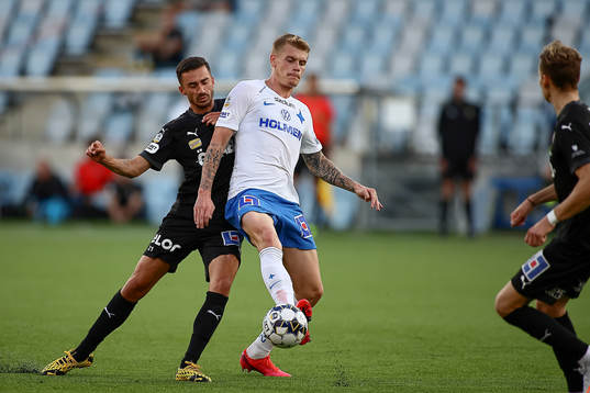 Örebros Simon Amin och IFK Norrköpings Eric Smith