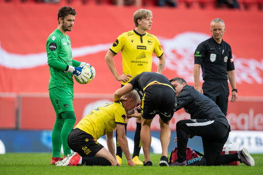 Kristoffer Tønnesen of Start receives medical attention