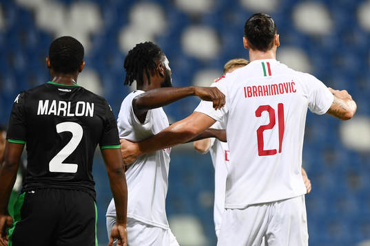 Zlatan Ibrahimovic of AC Milan celebrates with team mates