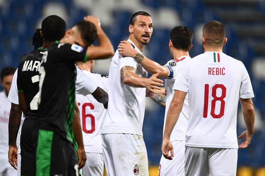 Zlatan Ibrahimovic of AC Milan celebrates with team mates