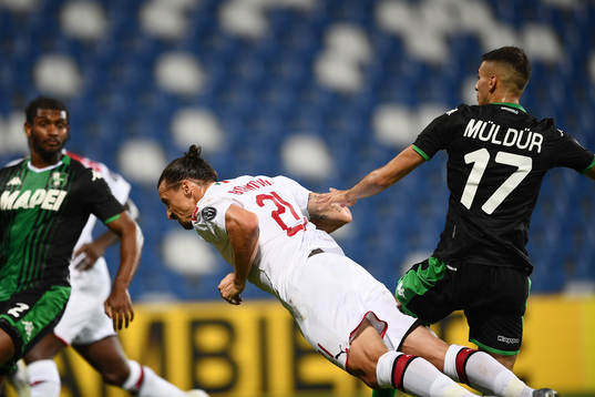 Zlatan Ibrahimovic of AC Milan scores the first goal