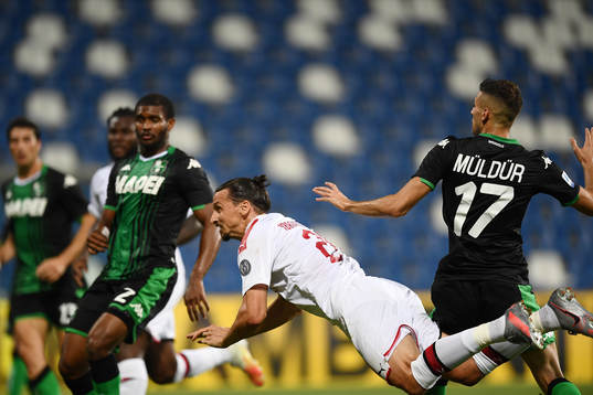 Zlatan Ibrahimovic of AC Milan scores the first goal