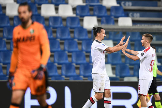 Zlatan Ibrahimovic of AC Milan celebrates with team mates