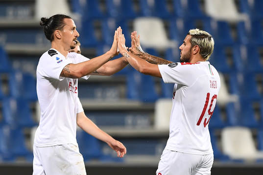 Zlatan Ibrahimovic of AC Milan celebrates with Theo