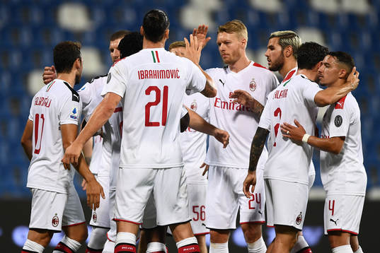 Zlatan Ibrahimovic of AC Milan celebrates with team mates