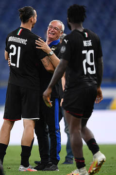 Zlatan Ibrahimovic of AC Milan and Claudio Ranieri, head